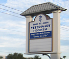 Port St. John Veterinary Hospital - Cantilevered Pylon Sign with changeable letter track