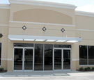 Debary Business Center: Sun Control Canopy system across every storefront.