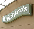 Knightros @ UCF - Custom Wall Sign with internally-illuminated push-thru copy.