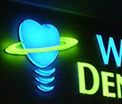 Wickham Dental Care in Melbourne, FL. All Acrylic Channel Icon with Standard Channel Letters. LED Illuminated.