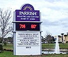 Parrish Healthcare Center in Port St. John - Monument sign with radiused trim and Watchfire Message Display