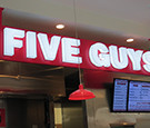 Five Guys at The Florida Mall - LED-illuminated All-Acrylic Channel Letters on Suspended Cabinet