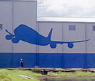 Melbourne International Airport - 88ft long 747 Plane Icon - Routed aluminum composite panels mounted to side of 747 plane hanger