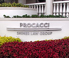 Procacci in Boca Raton, FL - Stainless steel reverse channel letters, radius bars, and flat-cut letters on stand-offs
