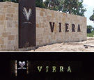 Viera Gateway Sign - Viera, Florida - Halo-lit Corten Steel routed panel and letters over coral veneer