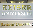 Keiser University Jacksonville, FL - Flat-cut acrylic lettering with brushed finish metal faces