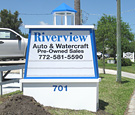 Riverview Auto - V-shaped monument sign with illuminated cupola
