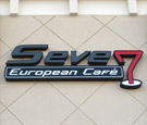 Seven: European Cafe - Channel Letters and Capsule. Letters use perforated vinyl overlay to look black by day, and white by night.